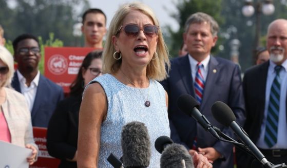 Republican Rep. Mary Miller of Illinois talks to reporters while announcing new anti-abortion legislation with fellow Republicans Rep. Chip Roy of Texas, right, and Sen. Steve Daines of Montana outside the U.S. Capitol in Washington on Wednesday.