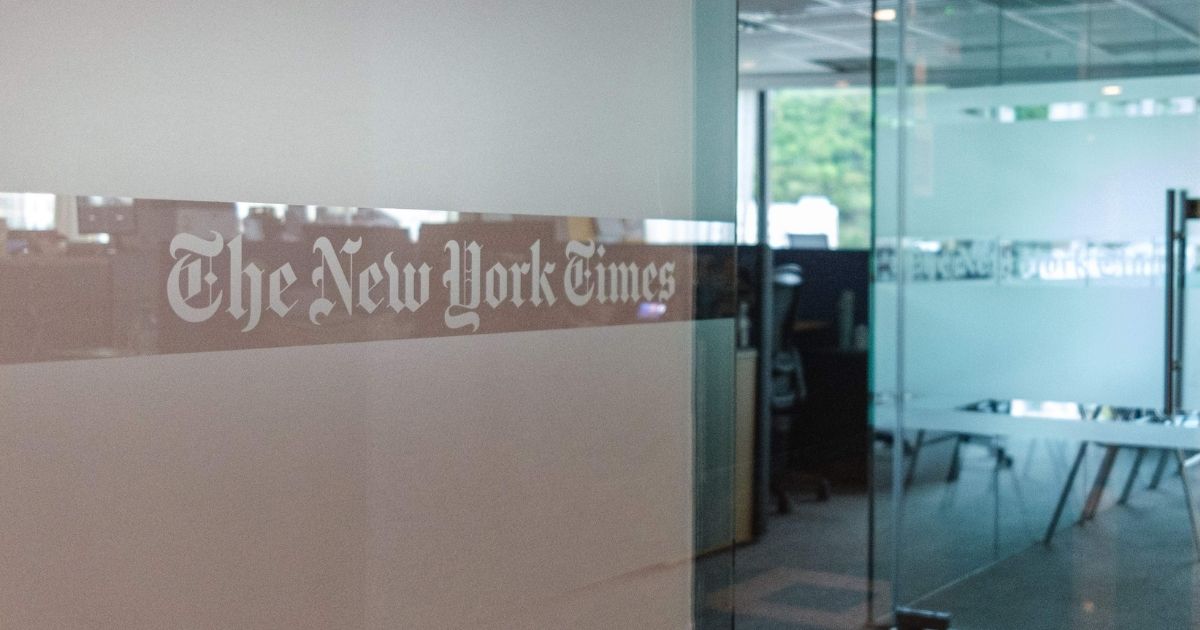 A logo is seen at the entrance of The New York Times offices in Hong Kong on July 15, 2020.
