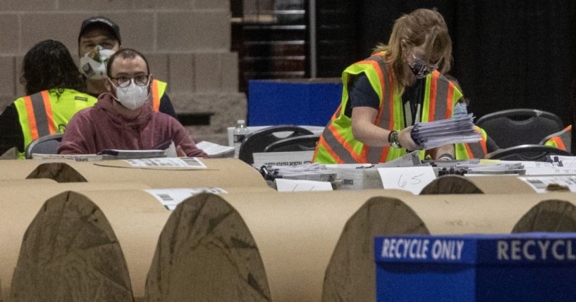Election workers count ballots at the Philadelphia Convention Center on Nov. 6, 2020 in Philadelphia, Pennsylvania.