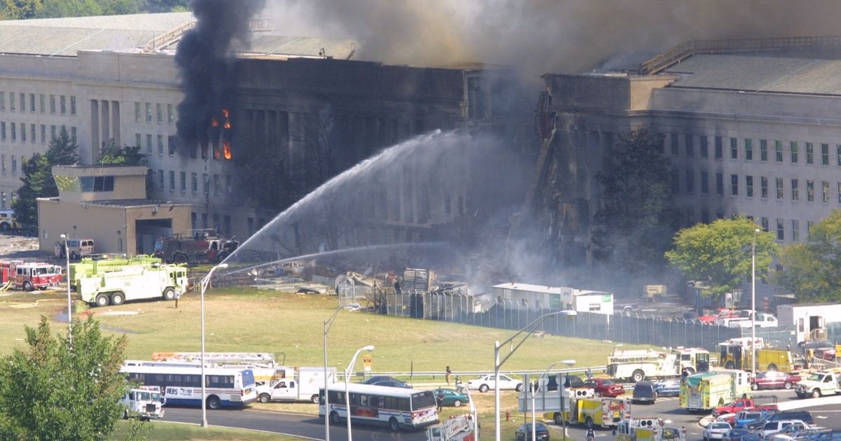 Smoke comes out from the west wing of the Pentagon building on Sept. 11, 2001, in Arlington, Virginia, after a plane crashed into the building and set off a huge explosion.