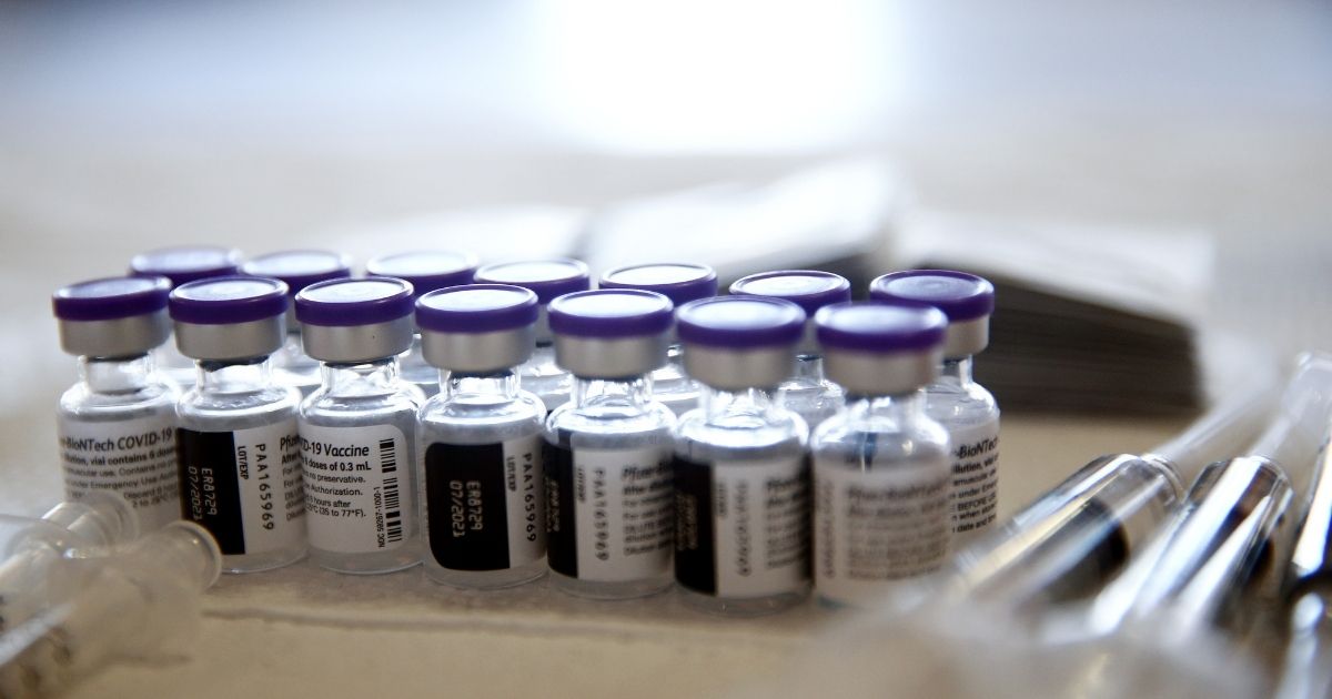 Vials containing doses of the Pfizer COVID-19 vaccine are viewed at a clinic targeting minority community members at St. Patrick's Catholic Church on April 9 in Los Angeles.