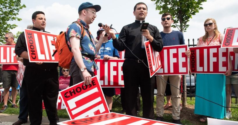 Pro-life demonstrators hold a protest outside the Planned Parenthood Reproductive Health Services Center in St. Louis on May 31, 2019.