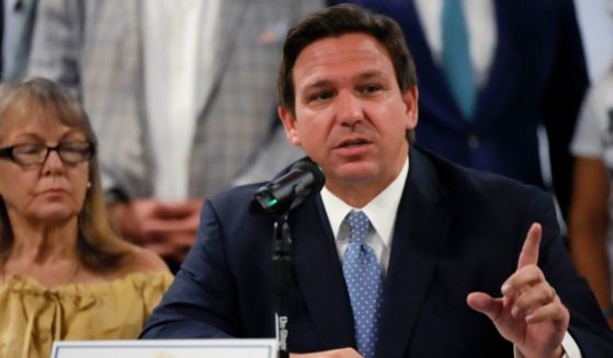 Republican Florida Gov. Ron DeSantis speaks to journalists following a round table on July 13, 2021, at the American Museum of the Cuban Diaspora in Miami.