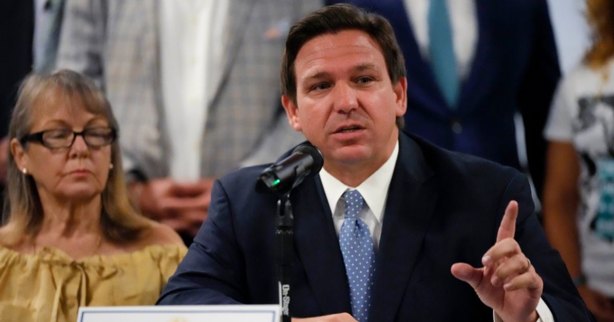Republican Florida Gov. Ron DeSantis speaks to journalists following a round table on July 13, 2021, at the American Museum of the Cuban Diaspora in Miami.