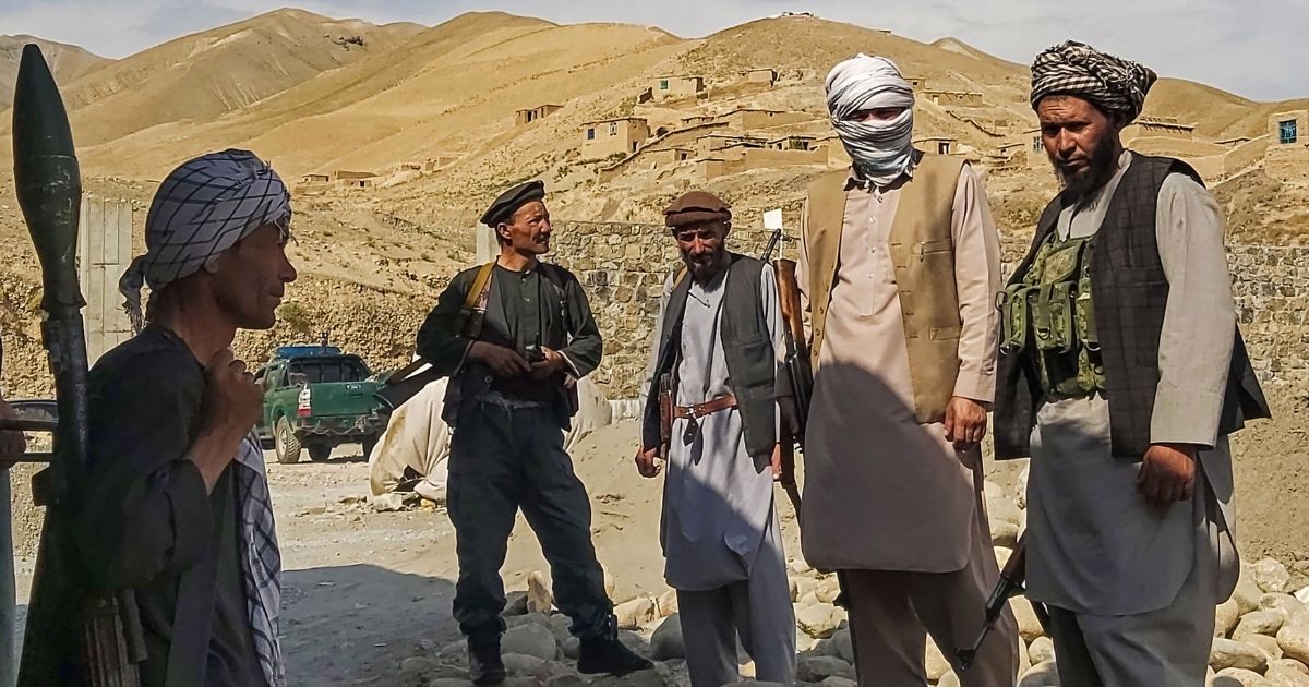 Afghan militia forces stand guard at an outpost in the northern Takhar province on Tuesday.