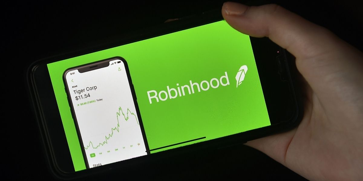 This photo illustration shows the logo of trading application Robinhood on a mobile phone in Arlington, Virginia, on Jan. 28, 2021.