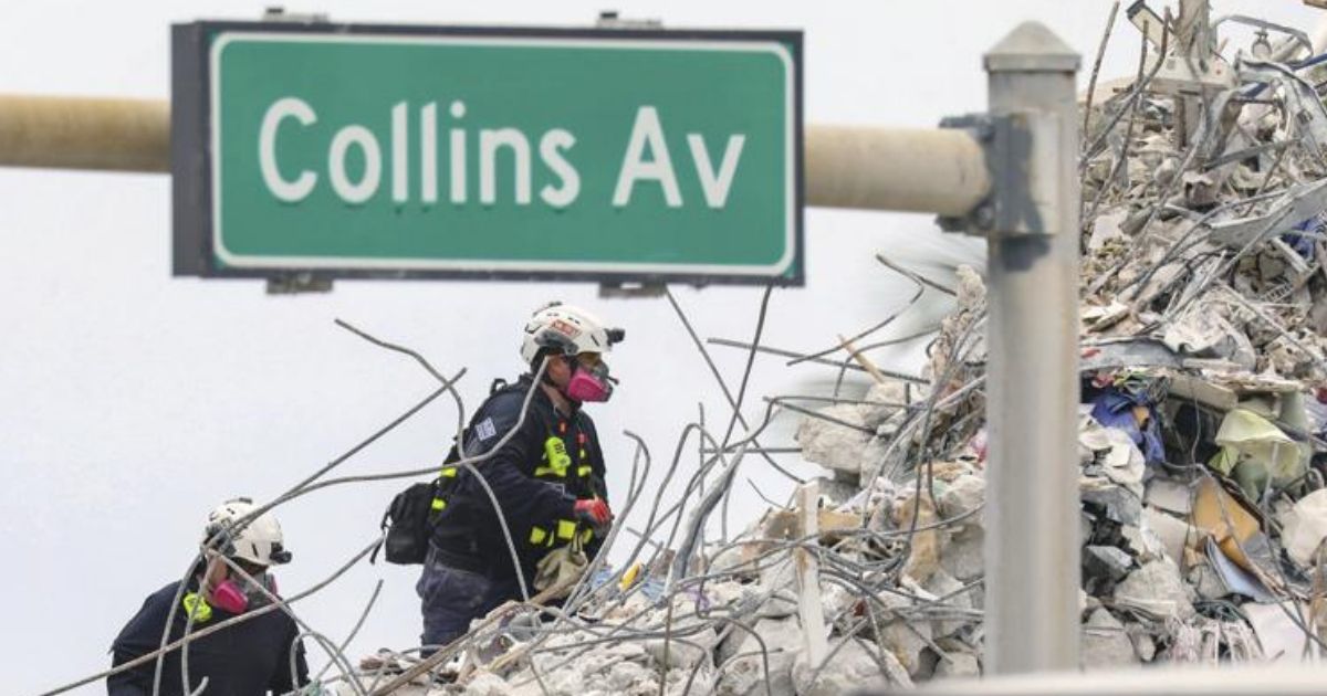 A rescue team is seen walking through the debris at the Champlain Towers South Condo in Surfside, Florida, on July 7.