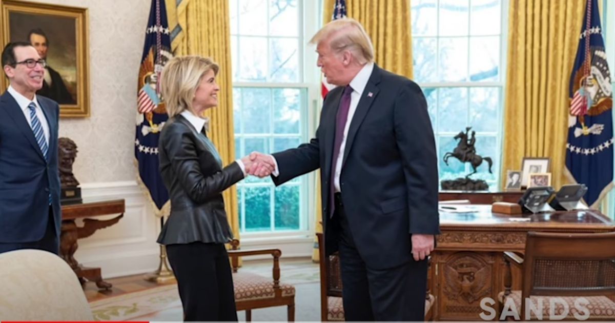 Carla Sands is greeted by President Donald Trump during Trump's tenure in the White House. Sands was the U.S. ambassador to Denmark.
