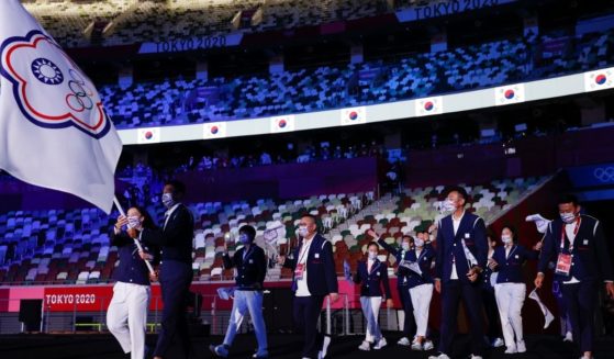 Athletes from Tawain, competing in the 2020 Summer Olympics as Team Chinese Taipei, enter Olympic Stadium in Tokyo during Friday's opening ceremonies.
