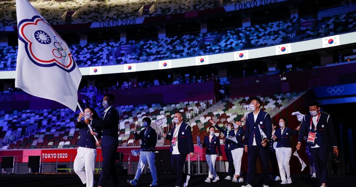 Athletes from Tawain, competing in the 2020 Summer Olympics as Team Chinese Taipei, enter Olympic Stadium in Tokyo during Friday's opening ceremonies.