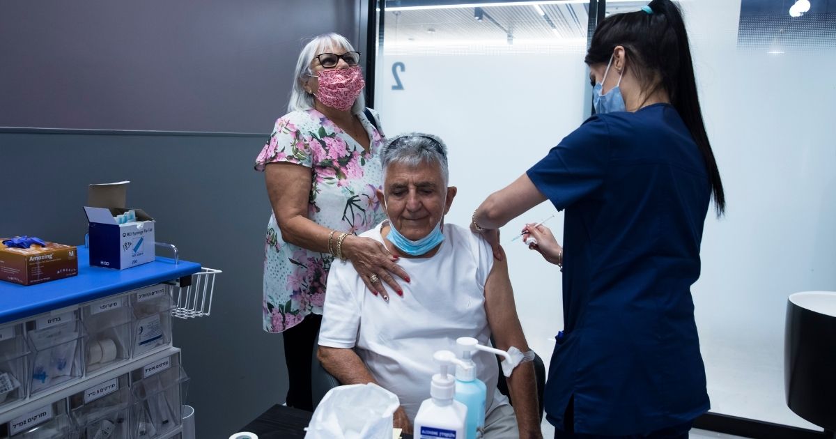 A leukemia patient receives his third dose of the COVID-19 vaccine at the Sheba Medical Center in Ramat Gan, Israel, on July, 14, 2021.