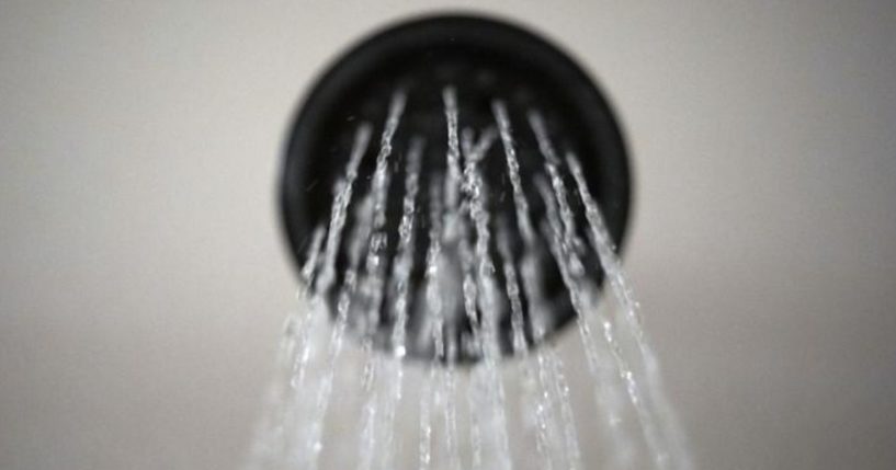 In this Aug. 12, 2020, file photo, water flows from a showerhead in Portland, Oregon.