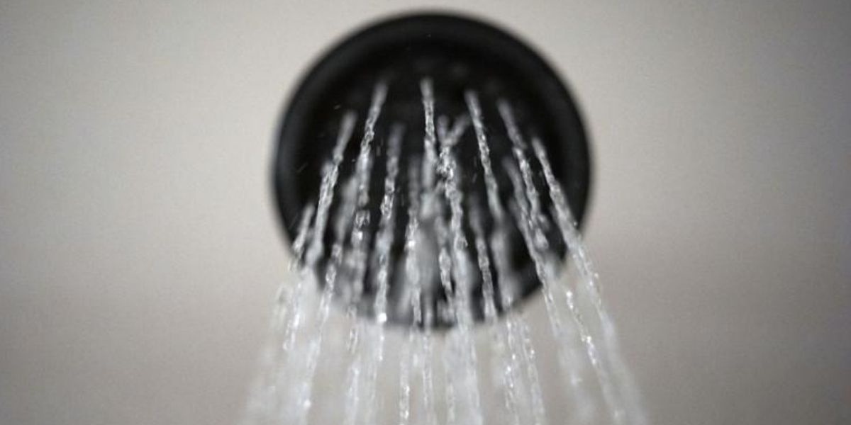 In this Aug. 12, 2020, file photo, water flows from a showerhead in Portland, Oregon.