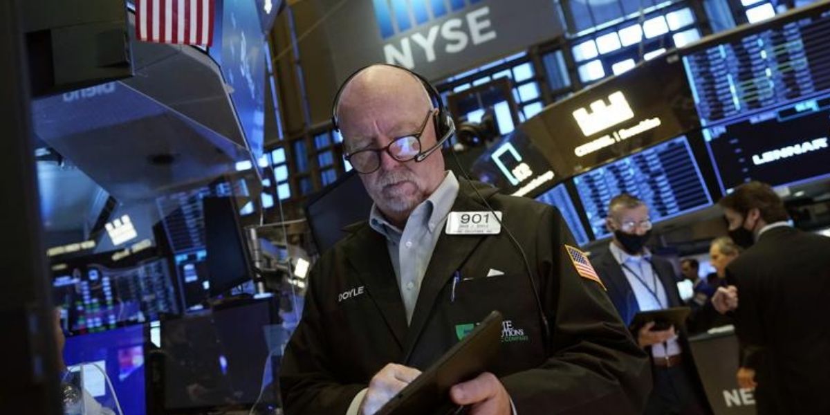 Trader John Doyle works on the floor of the New York Stock Exchange on Friday.