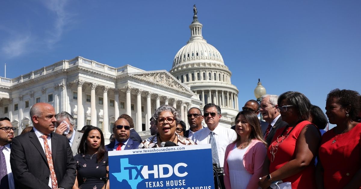 Joined by fellow Texas state House Democrats, Rep. Senfronia Thompson speaks during a news conference on voting rights outside the U.S. Capitol on July 13.