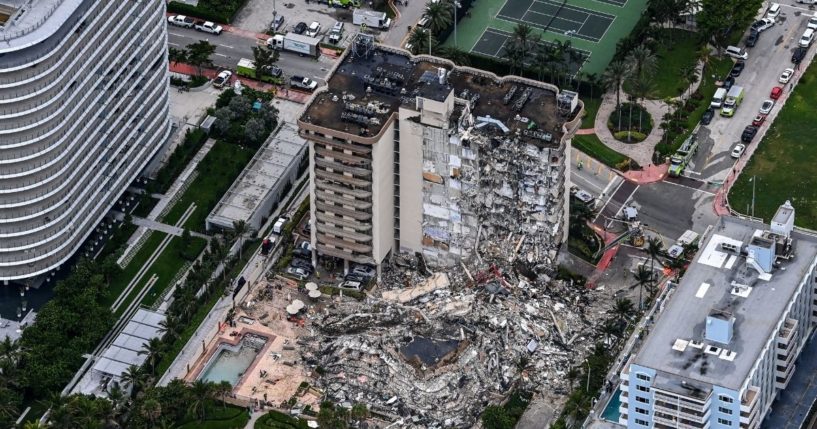 The partial collapse of the Champlain Towers South in Surfside, Florida, which occurred on June 24, 2021, is depicted in a photo showing an aerial point of view.