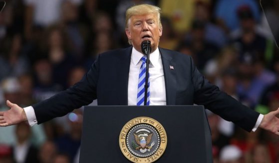 Then-President Donald Trump speaks at a rally on Aug. 21, 2018, in Charleston, West Virginia.