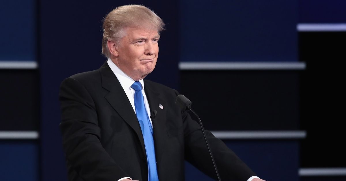 Then-Republican presidential nominee Donald Trump looks on during the Presidential Debate at Hofstra University on Sept. 26, 2016, in Hempstead, New York.