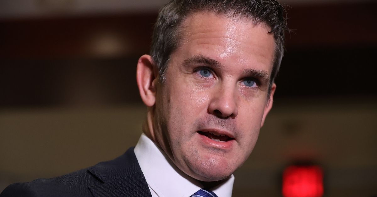 Illinois Republican Rep. Adam Kinzinger talks to reporters following a House Republican conference meeting in the U.S. Capitol Visitors Center in Washington on May 12.