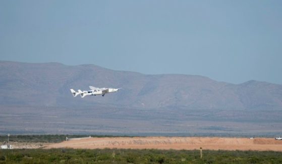 Virgin Galactic's VMS Eve carries the VSS Unity on takeoff from Spaceport America on Sunday in Truth Or Consequences, New Mexico. Aboard VSS unity are pilots Dave Mackay and Michael Masucci, and mission specialists Sirisha Bandla, British billionaire and founder of Virgin Galactic Sir Richard Branson, Colin Bennett, and Beth Moses. The VSS Unity is scheduled to travel to an altitude of over 50 miles above the Earth.