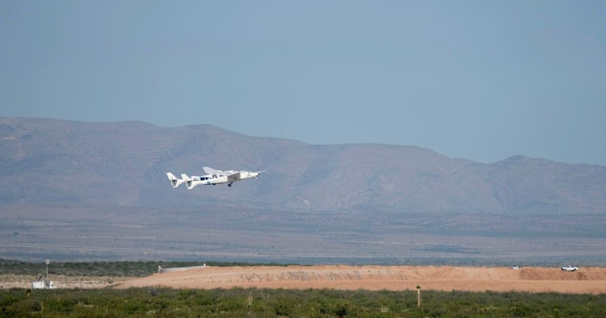 Virgin Galactic's VMS Eve carries the VSS Unity on takeoff from Spaceport America on Sunday in Truth Or Consequences, New Mexico. Aboard VSS unity are pilots Dave Mackay and Michael Masucci, and mission specialists Sirisha Bandla, British billionaire and founder of Virgin Galactic Sir Richard Branson, Colin Bennett, and Beth Moses. The VSS Unity is scheduled to travel to an altitude of over 50 miles above the Earth.