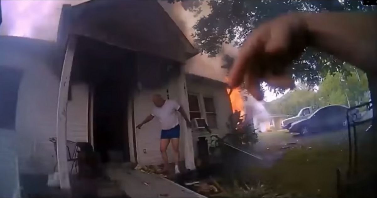 Bodycam footage from Officer Ervin, who raced into a burning house to save a disabled woman, is shown.