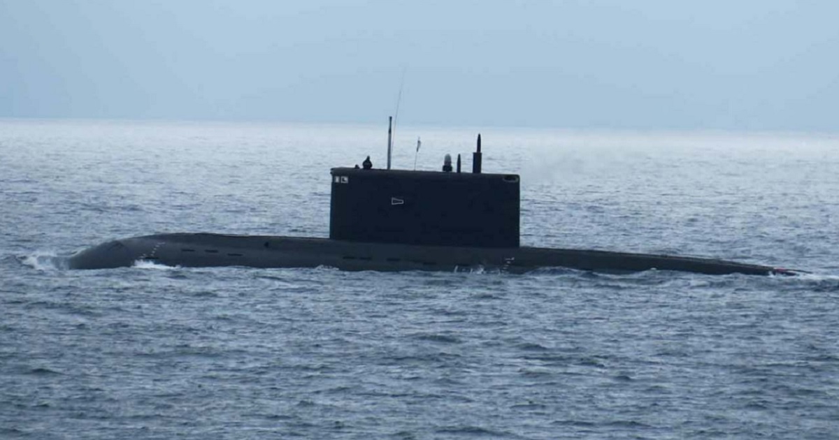 A Russian Kilo class submarine partially submerged.