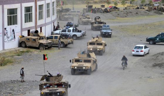 Afghan security forces in Humvee vehicles move in a convoy in the Parakh area in Bazarak, Panjshir province, on Friday.