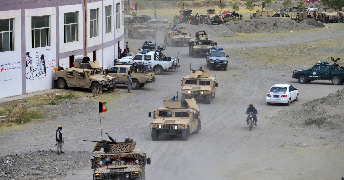 Afghan security forces in Humvee vehicles move in a convoy in the Parakh area in Bazarak, Panjshir province, on Friday.