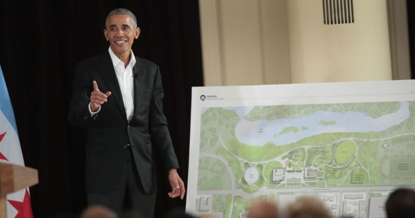 Former President Barack Obama points out features of the proposed Obama Presidential Center during a gathering at the South Shore Cultural Center on May 3, 2017, in Chicago.