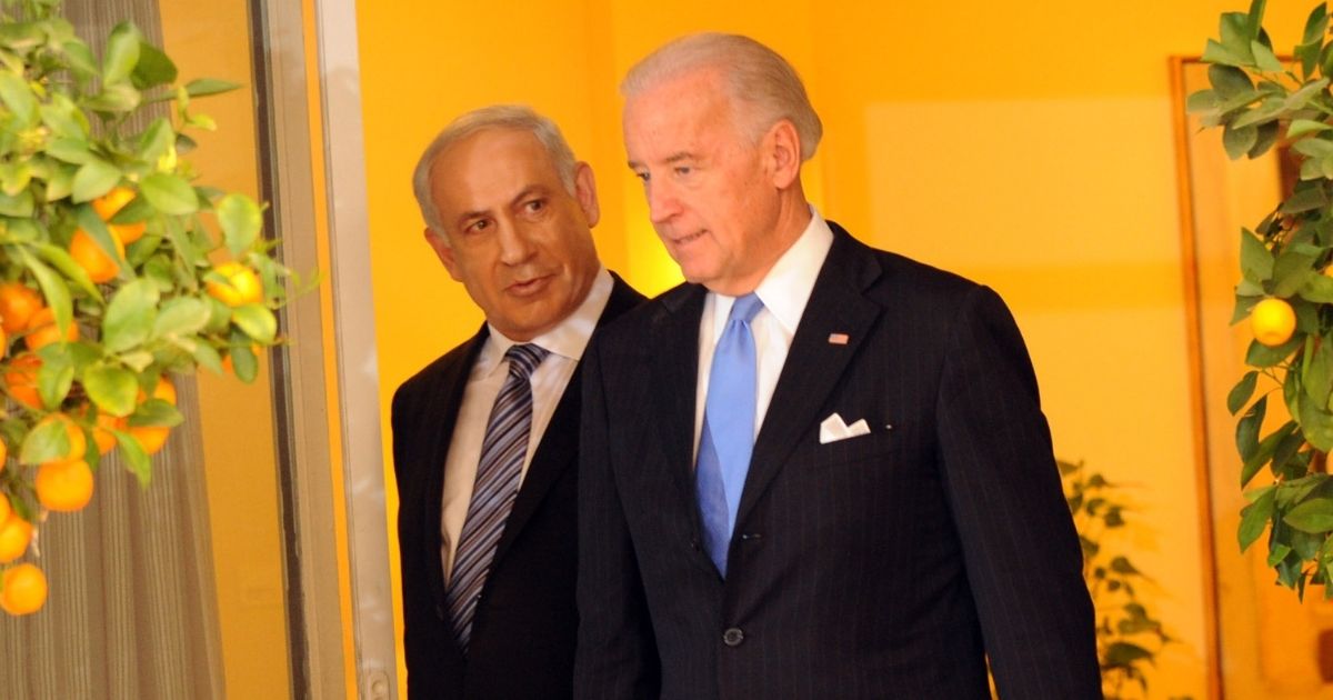 Then-Israeli Prime Minister Benjamin Netanyahu, left, and then-U.S. Vice President Joe Biden walk in the prime minister's residence on March 9, 2010, in Jerusalem, Israel.