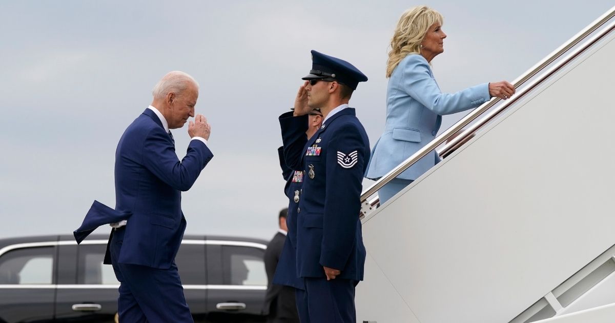 President Joe Biden salutes as he and first lady Jill Biden board Air Force One at Andrews Air Force Base, Maryland, on May 28, 2021.