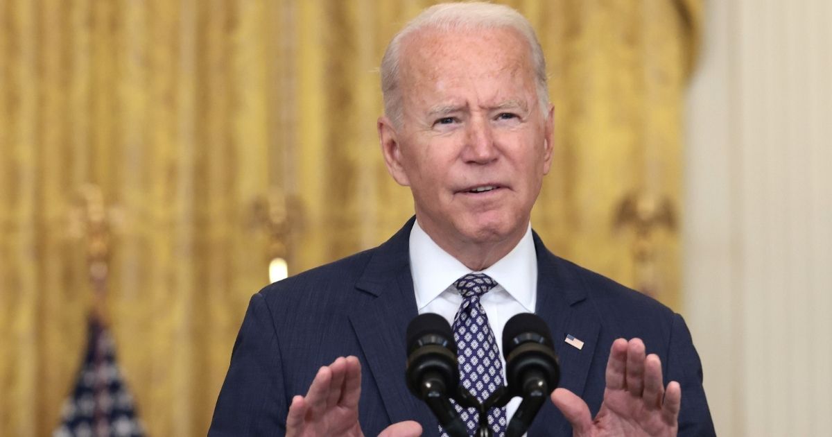 President Joe Biden gestures as delivers remarks on the U.S. military’s ongoing evacuation efforts in Afghanistan from the East Room of the White House on Friday in Washington, D.C.