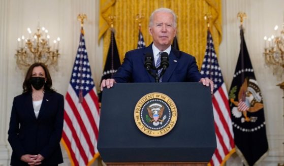 President Joe Biden, right, address the country with support from Vice President Kamala Harris in their last public appearance together on Aug. 10.