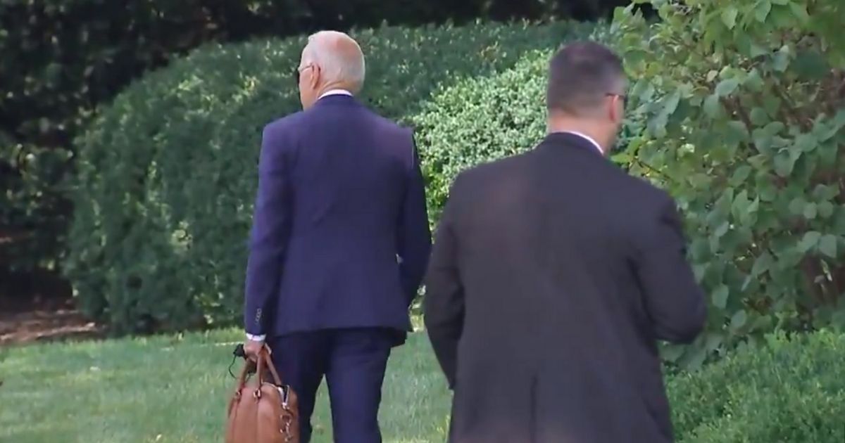 President Joe Biden appears lost as he returns to the White House.