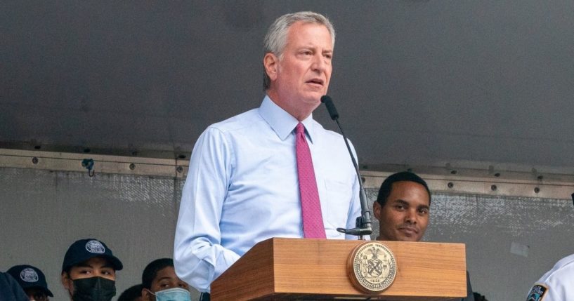 Democratic New York City Mayor Bill DeBlasio presents a proclamation at the 46th Precincts National Night Out on Tuesday in the Bronx borough of New York City.