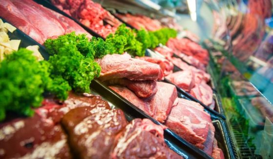 Meat is seen displayed at a butcher shop in the stock image above.
