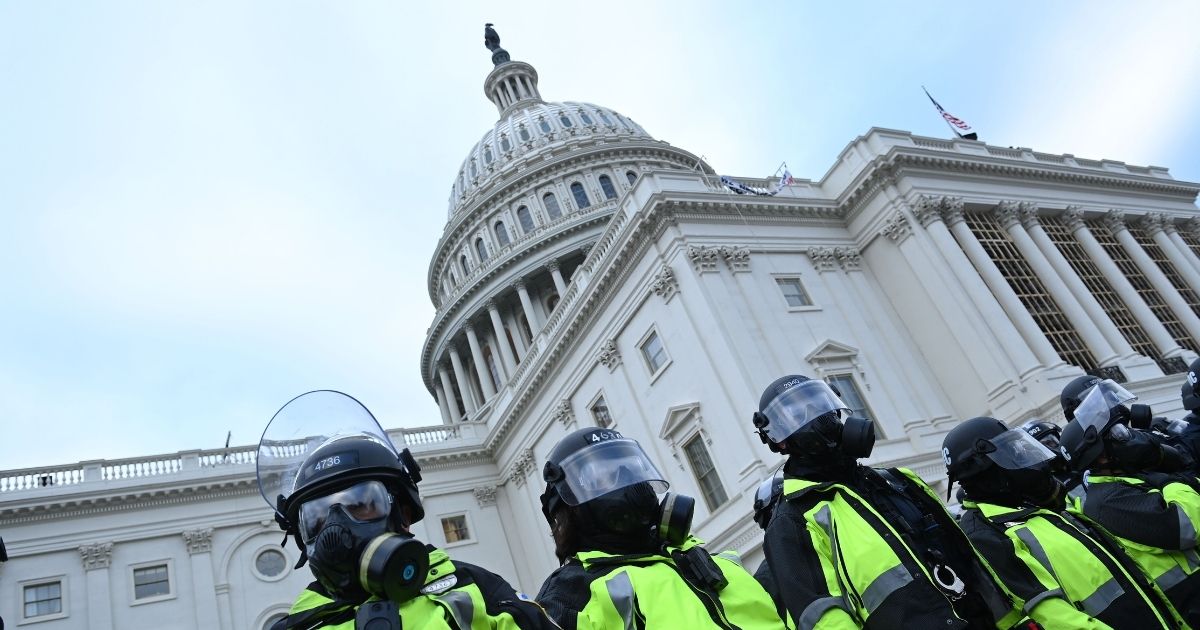 Police stand outside the U.S. Capitol on Jan. 6, 2021, in Washington, D.C.