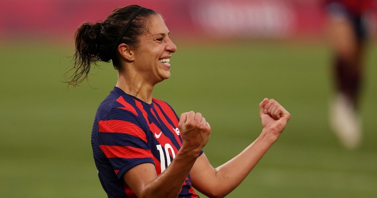 Carli Lloyd celebrates after scoring the fourth goal for the U.S. in its bronze medal match against Australia in the Tokyo Olympics at Kashima Stadium in Kashima, Japan, on Thursday.