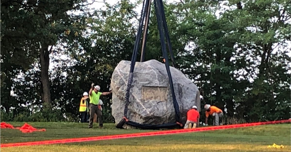 Chamberlin Rock is removed from the University of Wisconsin campus on Friday.