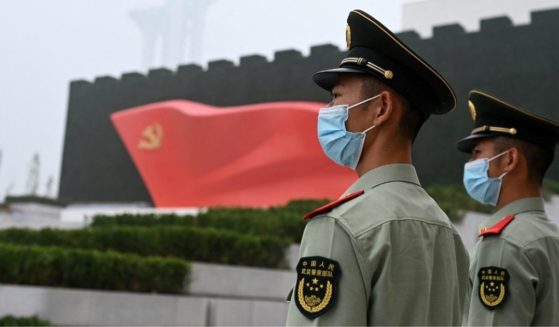 Paramilitary police stand outside the Museum of the Communist Party of China in Beijing on June 25, 2021.