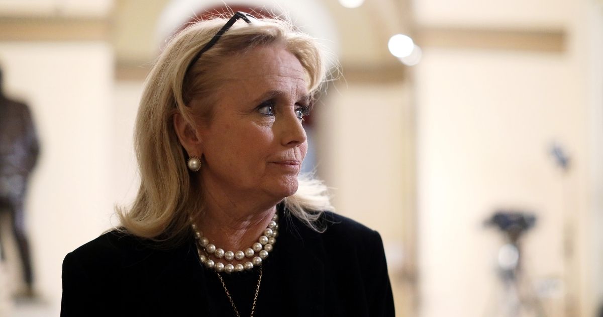 Democratic Rep. Debbie Dingell of Michigan is seen in a hallway of the U.S. Capitol prior to an event at the Rayburn Room on Dec. 19, 2019.