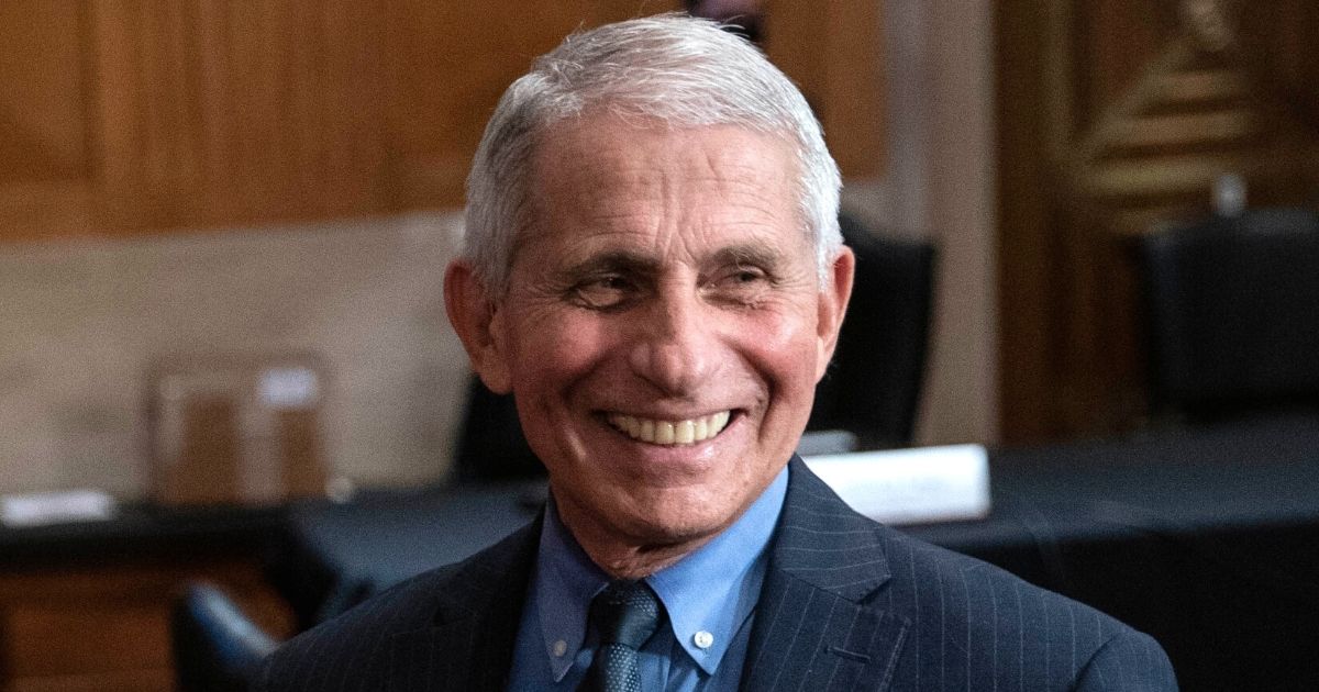 Dr. Anthony Fauci, director of the National Institute of Allergy and Infectious Diseases, smiles after a Senate subcommittee hearing on Capitol Hill in Washington on May 26.