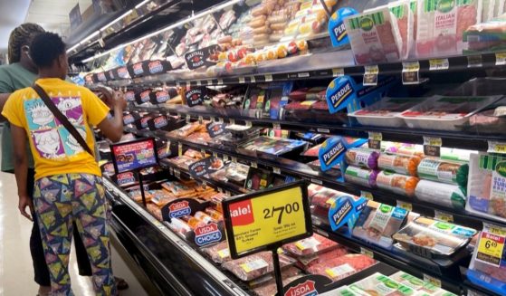 Customers shop for meat at a supermarket on June 10, 2021 in Chicago, Illinois.