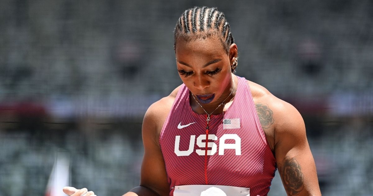 Gwen Berry competes in the women's hammer throw qualification during the Tokyo Olympic Games at the Olympic Stadium in Tokyo on Sunday.