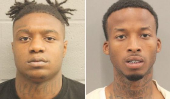 Frederick Jackson, left, and Anthony Jenkins were arrested by the Houston Police Department on Friday in connection with the murder of a retired New Orleans police officer.