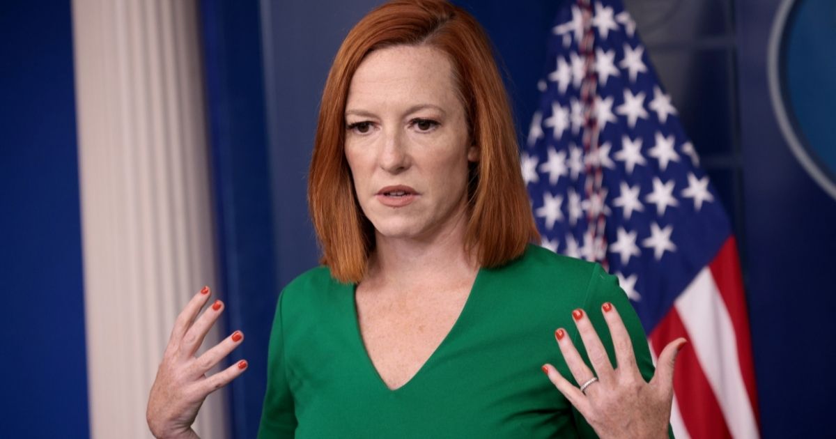 White House press secretary Jen Psaki answers questions during the daily briefing in Washington on Friday.