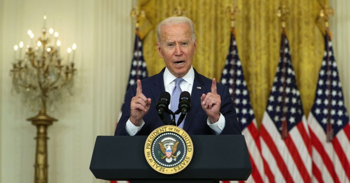 President Joe Biden delivers remarks in the East Room of the White House on Thursday in Washington, D.C.