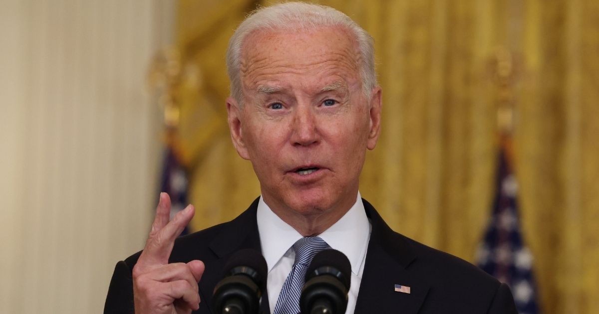 President Joe Biden gestures as he speaks about the disastrous U.S. withdrawal from Afghanistan in the East Room of the White House in Washington on Monday.
