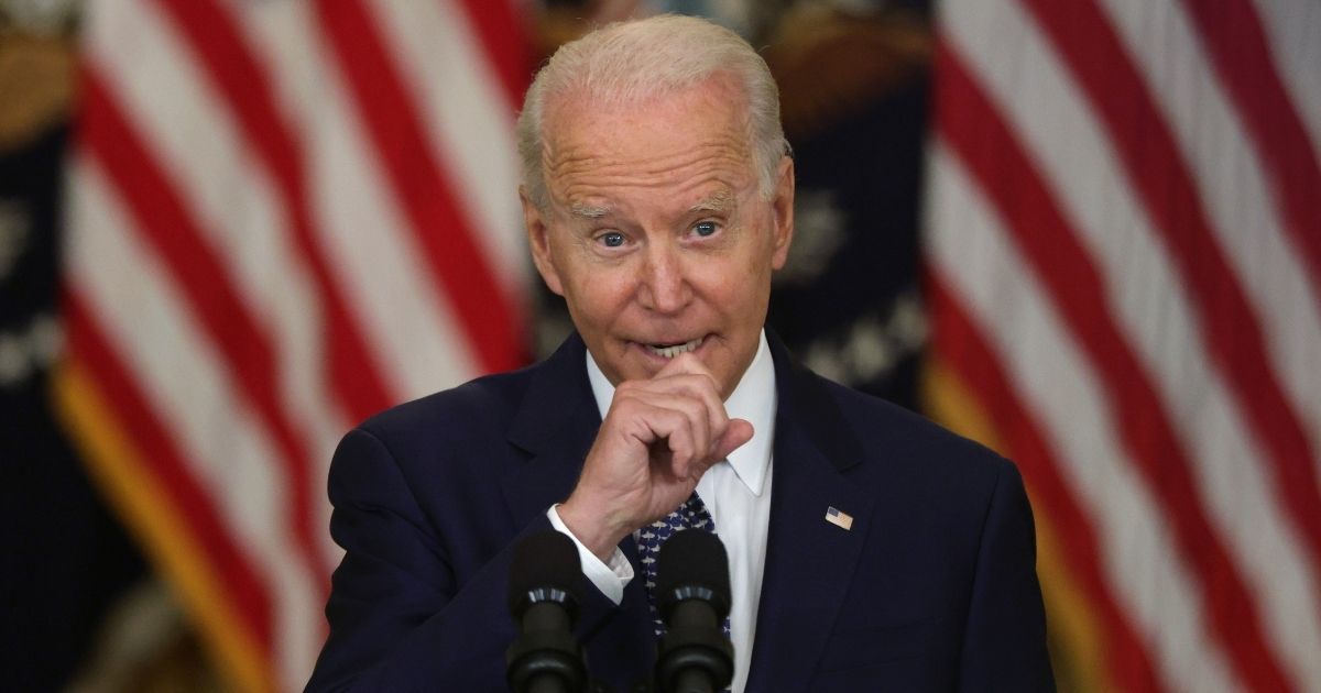 President Joe Biden speaks during an event on Senate passage of the Infrastructure Investment and Jobs Act in the East Room of the White House on Tuesday in Washington, D.C.